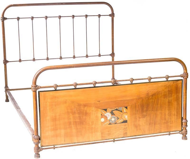 Iron Bed: Iron bed frame, circa 1900, floral motif, inlay accents 64” tall x 82” long x 54.5” wide State-wide delivery is available for this item. Please email shipping@vogtauction.com or call 210-822-61