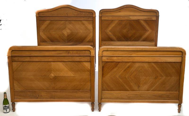 Pair of Louis XV-Style Beds: Louis XV-style, circa 1890, inlay accents, European mattress size, smaller than American twin mattress size 64" tall x 47" wide x 74" long State-wide delivery is available for this item. Please email