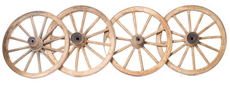 Lot of 4 Rustic Wagon Wheels: Lot of 4 rustic wooden wagon wheels, metal accents 38" diameter/ Each State-wide delivery is available for this item. Please email shipping@vogtauction.com or call 210-822-6155 for a quote. IN-HOUSE S