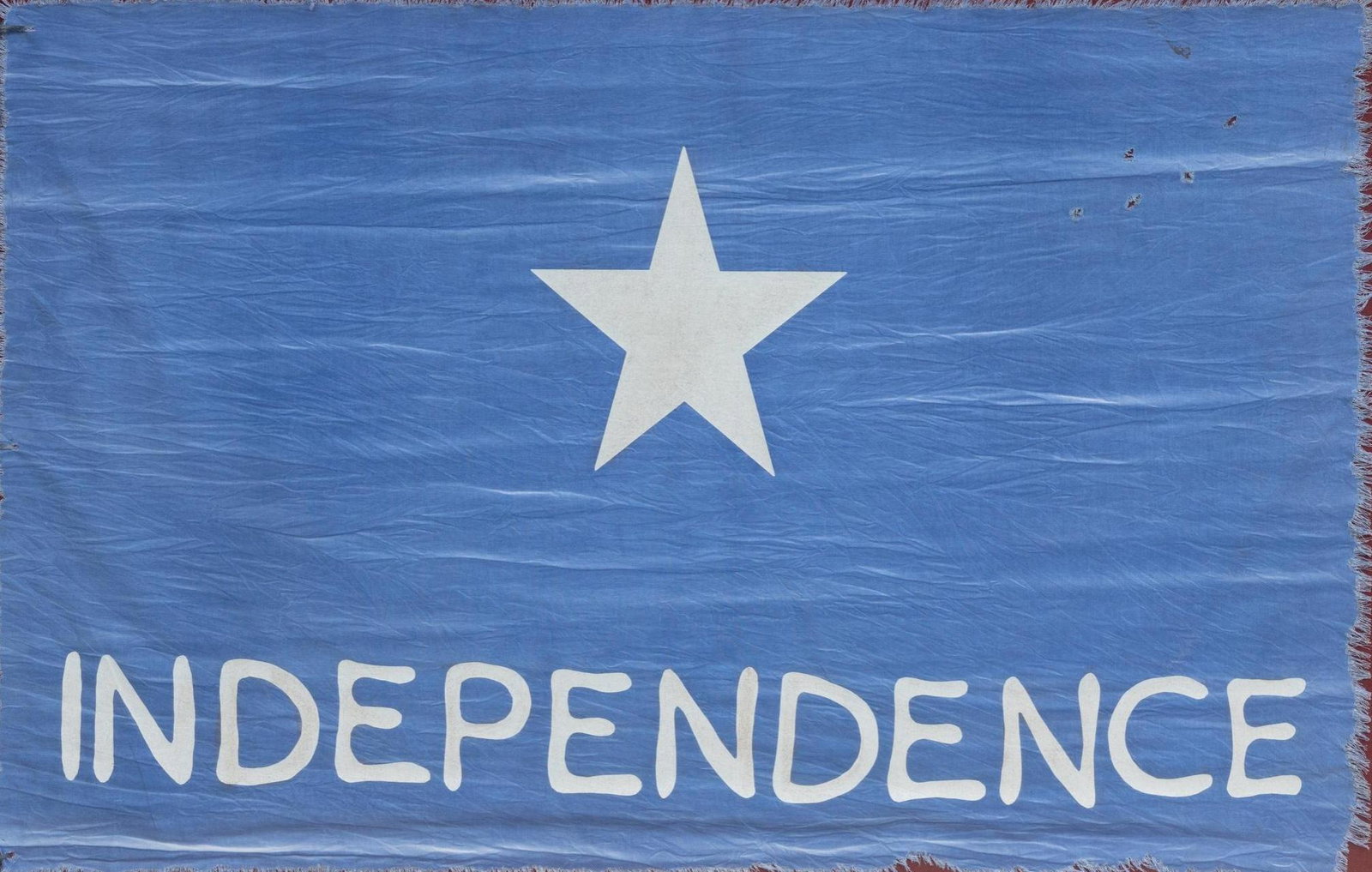 Framed Texas Independence Flag: Framed Texas Independence flag, fabric sight: 25 x 38", frame: 31 x 45.5" Condition: Damage to fabric on edges State-wide delivery is available for this item. Please email shipping@vogtauction.c