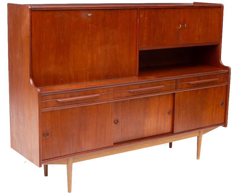 Mid-Century Danish Cabinet: Mid-Century Danish cabinet, sectional piece, internal mirrored motif, hinged door, multiple doors 54" tall x 72.5" wide x 20" deep State-wide delivery is available for this item. Please email shipping