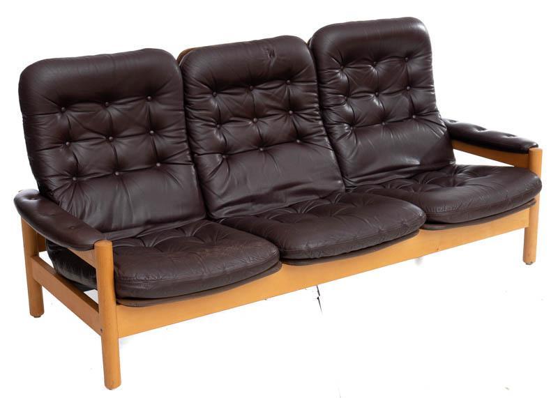 Mid-Century Danish Sofa: Mid-Century Danish sofa, button back, dark brown leather, wooden frame 37" tall x 72" wide State-wide delivery is available for this item. Please email shipping@vogtauction.com or call 210-822-6155 fo