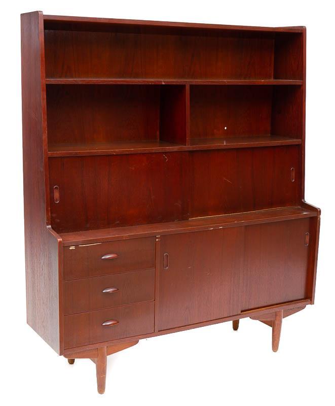 Mid-Century Danish Cabinet: Mid-Century Danish cabinet, 4-sliding doors, 3-drawers 69" tall x 59" wide x 17.5" deep Condition: Scuffs and scrapes, small hole in back State-wide delivery is available for this item. Please email s