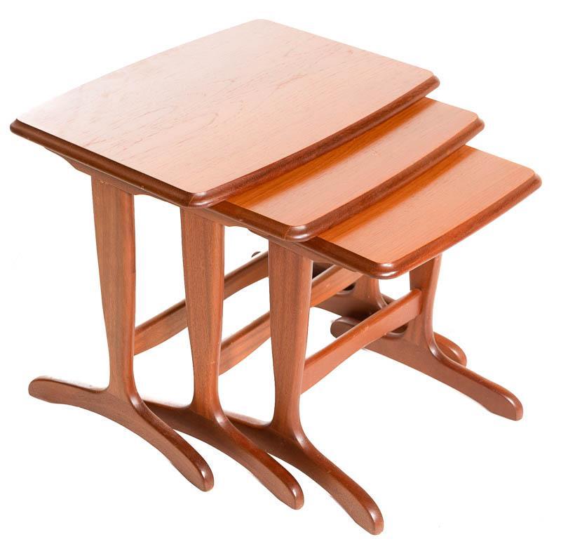 Mid-Century Teak Nest of Tables: Mid-Century teak nest of tables, cross stretched legs 18.5" tall x 21.5" wide x 16" deep/ Largest