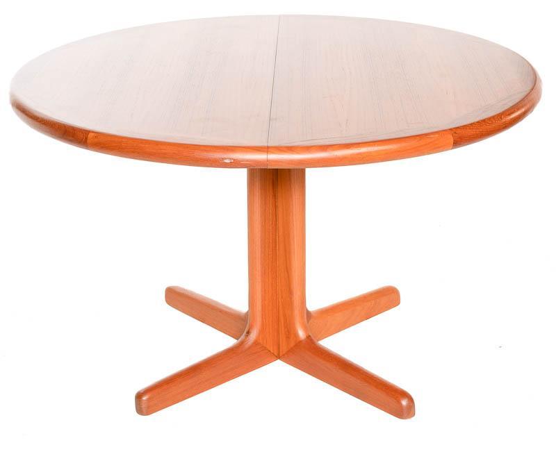 Mid-Century Teak Expandable Dining Table: Mid-Century teak expandable dining table, modern legs, single-leaf 28.5" tall x 64.5" wide x 47.5" deep/ Fully expanded State-wide delivery is available for this item. Please email shipping@vogtauctio