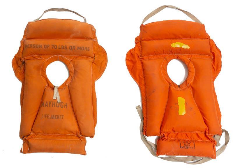 Pair of Vintage Naval Life Jackets: Pair of vintage naval life jackets, orange, with rope 42" tall x 26" wide/ Each State-wide delivery is available for this item. Please email shipping@vogtauction.com or call 210-822-6155 for a quote.&