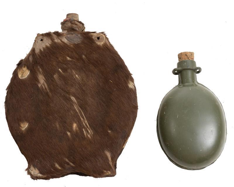 Pair of Vintage Canteens: Pair of vintage canteens, cow hide and metal 13" tall x 9.5" wide/ Largest