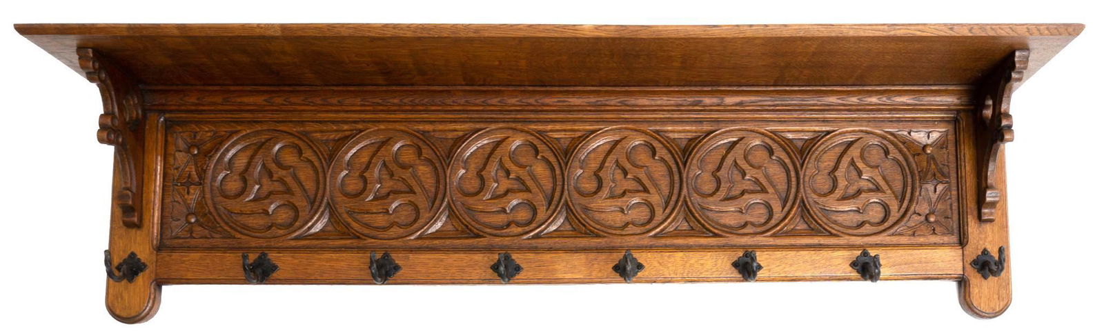 Wall Hanging Coat Rack: Wall hanging coat rack, carved accents, metal pegs 13" tall x 49" wide State-wide delivery is available for this item. Please email shipping@vogtauction.com or call 210-822-6155 for a quote. IN-H