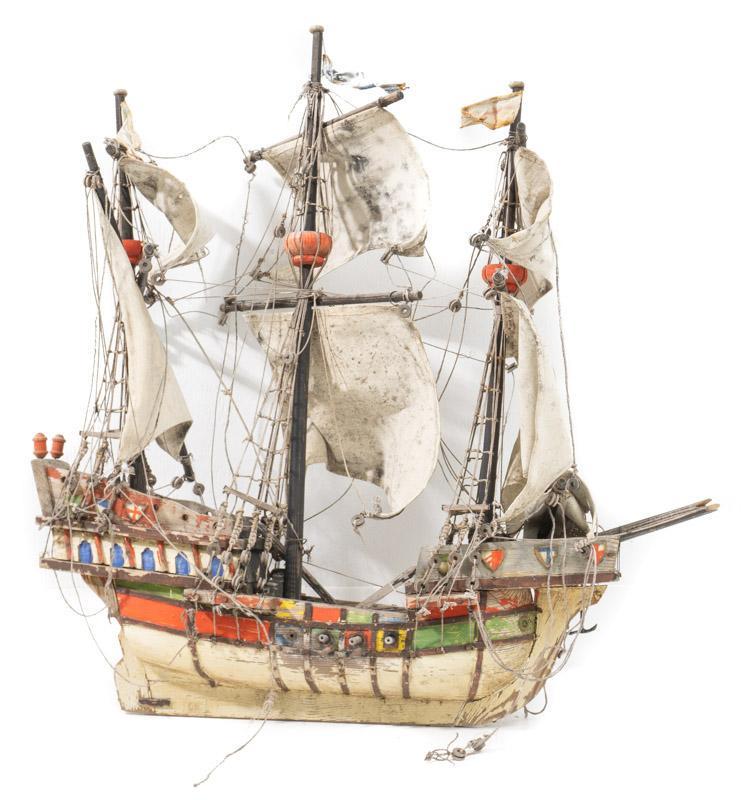 Vintage Model Ship: Vintage model ship, fabric and wooden 30" tall x 29" wide Condition: As is State-wide delivery is available for this item. Please email shipping@vogtauction.com or call 210-822-6155 for a quote. IN-HO
