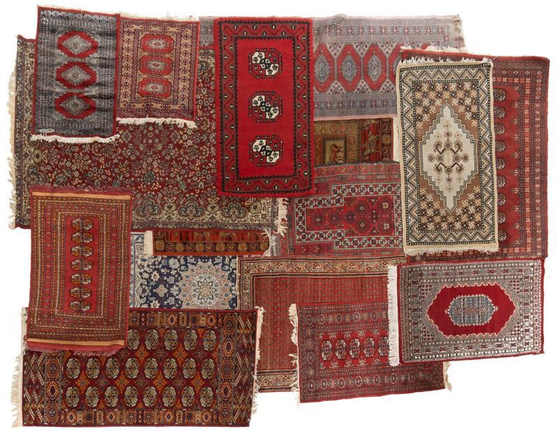Lot of 14 Rugs: Lot of 14 rugs, includes hand woven and machine-made, rug runners, estate rugs, prayer rugs 6'9" x 4'8"/ Largest