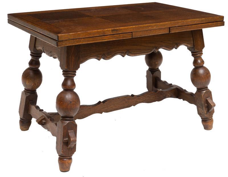 Expandable Dutch-Style Dining Table, circa 1880: Expandable Dutch-style dining table, circa 1880, includes 2-leaves, turned legs 21" tall x 56" wide x 20" deep Condition: Minor stain to surface State-wide delivery is available for this item. Please 