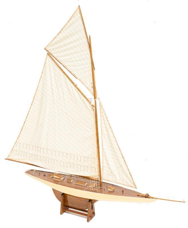 Monumental Model Ship with Stand: Monumental model ship, fabric, wooden, plastic, rope accents 67" tall x 68" wide x 9.5" deep State-wide delivery is available for this item. Please email shipping@vogtauction.com or call 210-822-6155