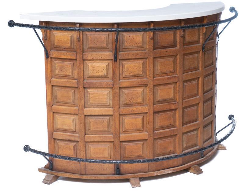 French Sectional Bar, circa 1920: French sectional bar, semi-circle, metal arm and footrest, geometric motif 41.5" tall x 66.5" wide x 28" deep State-wide delivery is available for this item. Please email shipping@vogtauction.com or c