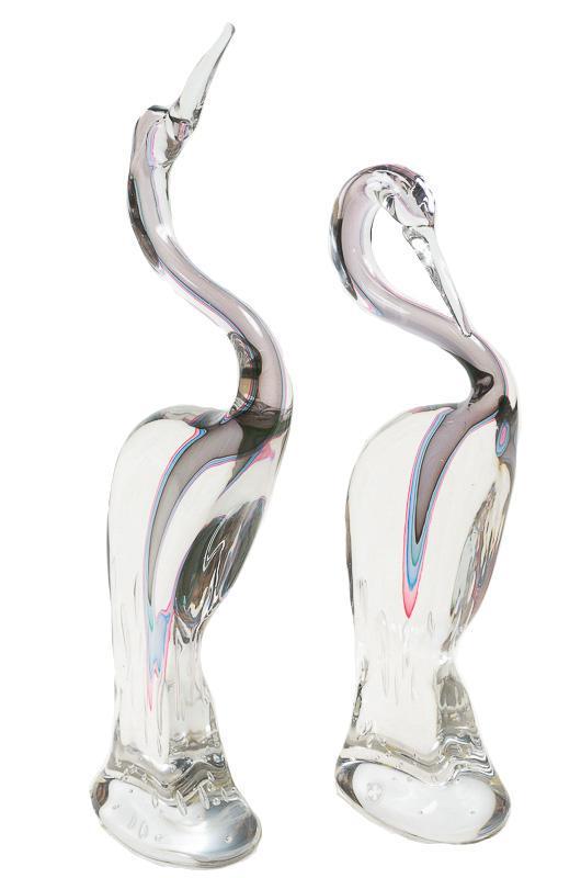 Pair of Art Glass Crane Statues: Provenance: The Estate of Barbara Kessler Banker Pair of art glass crane statues, purple and green 24" tall x 6.5" wide/ Largest