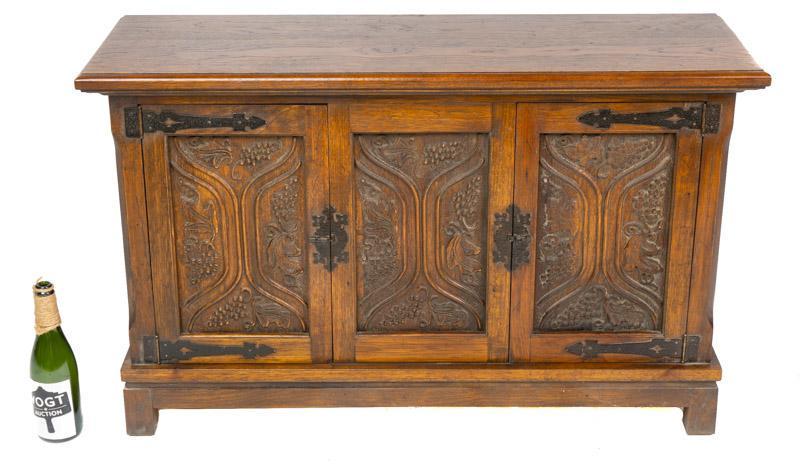 Spanish Iron Sideboard: Provenance: The Estate of Andy and Bea Copeland Spanish iron sideboard, metal accents, carved accents 27" tall x 44" wide x 15" deep State-wide delivery is available for this item. Please email shippi