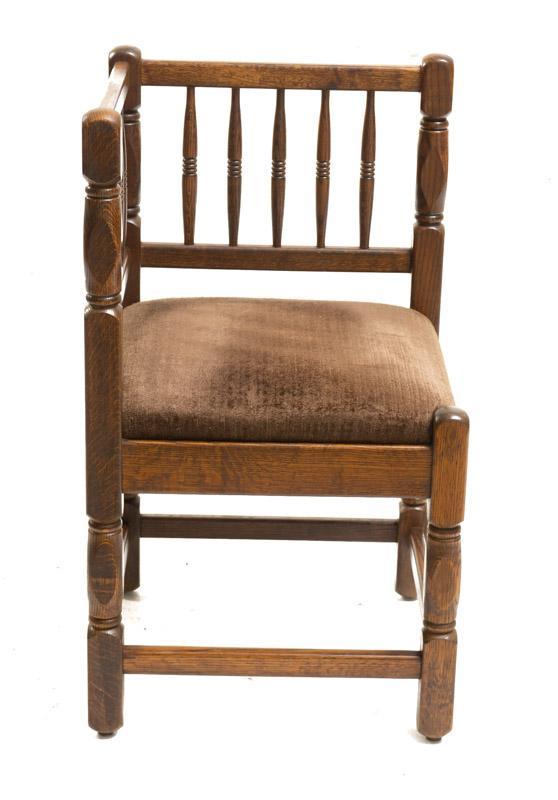 Vintage Velvet Seat Corner Chair: Vintage brown velvet seat corner chair, turned accents, cross stretched legs 31" tall x 18" wide x 26" deep State-wide delivery is available for this item. Please email shipping@vogtauction.com or cal