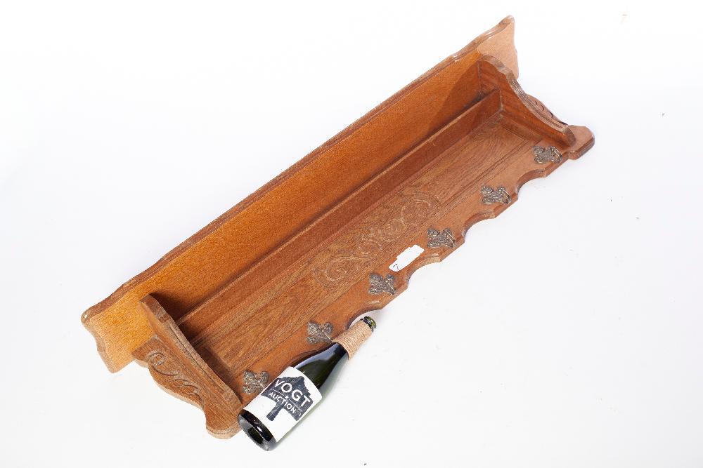 Rustic Wooden Wall Hanging Rack: Rustic wooden wall hanging rack, carved accents, metal hooks 12” tall x 44” wide State-wide delivery is available for this item. Please email shipping@vogtauction.com or call 210-822-6155