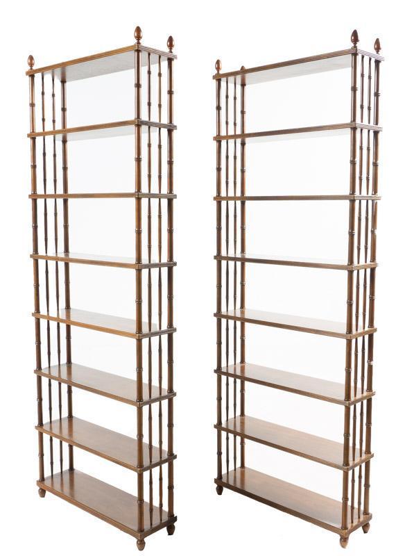 Pair of Mid-Century Bamboo Bookshelves: Provenance: An Olmos Park, TX Estate Pair of Mid-Century bamboo bookshelves, metal wall brackets, spire accents, 8-tiers each 82" tall x 30" wide x 8.5" deep/ Each State-wide delivery is available for