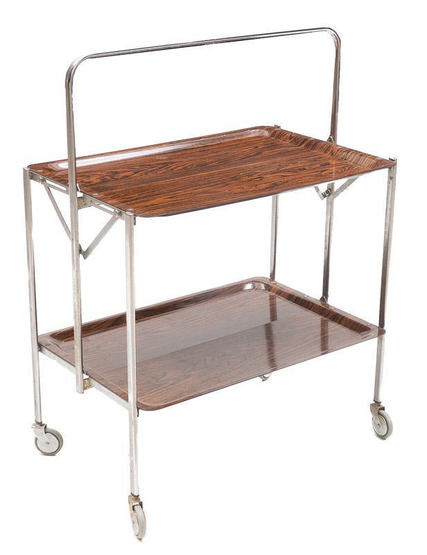Mid-Century Formica Bar Cart: Mid-Century formica bar cart, metal fixtures, on castors 33.5" tall x 25" wide x 16.5" deep State-wide delivery is available for this item. Please email shipping@vogtauction.com or call 210-822-6155 f
