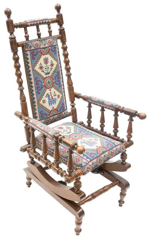 Dutch Wooden and Needlepoint Turned Rocking Chair: Dutch wooden and needlepoint turned rocking chair, abstract upholstery 47" tall x 22" wide x 24" deep State-wide delivery is available for this item. Please email shipping@vogtauction.com or call 210-