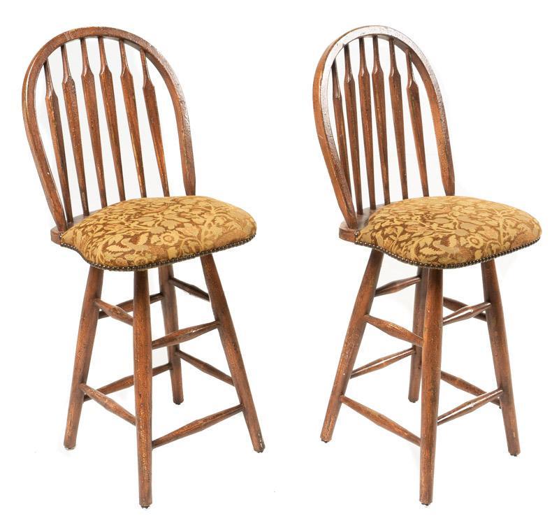 Pair of Vintage Farmhouse Bar Stools: Pair of vintage farmhouse bar stools, floral upholstery seats, stud accents, spindle back 42" tall x 17" wide x 17" deep/ Each State-wide delivery is available for this item. Please email shipping@vog