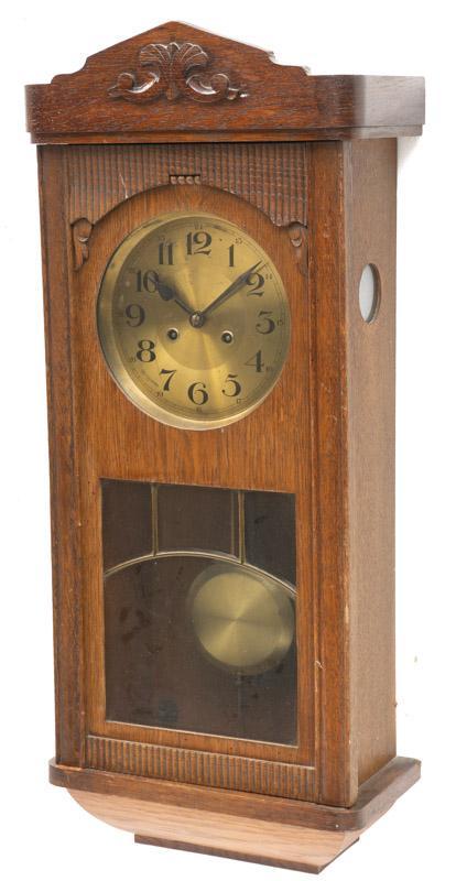 Vintage Wall Hanging Regulator Clock: Vintage wall hanging regulator clock, includes pendulum and key, wooden case 31" tall x 13.5" wide x 7" deep State-wide delivery is available for this item. Please email shipping@vogtauction.com or ca