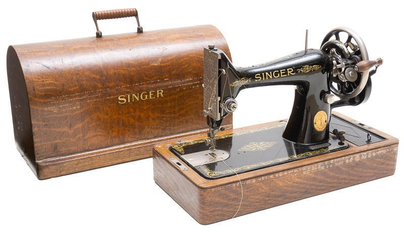 Vintage Singer Sewing Machine with Case: Vintage Singer sewing machine with case, handled, metal hardware 12.5" tall x 17" wide x 8.5" deep