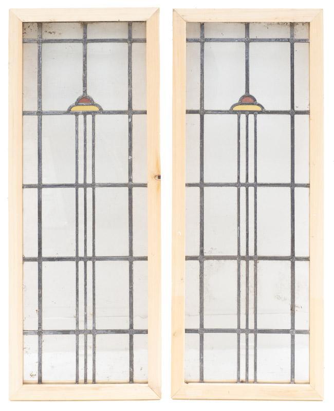 Pair of Leaded Glass Panels, Art Deco Motif: Pair of Leaded Glass Panels, Art Deco Motif 37" tall x 14.5" wide Note: Our stained glass is sold "where-is, as-is". Conditions are all commensurate with age. Where possible, obvious condition remarks