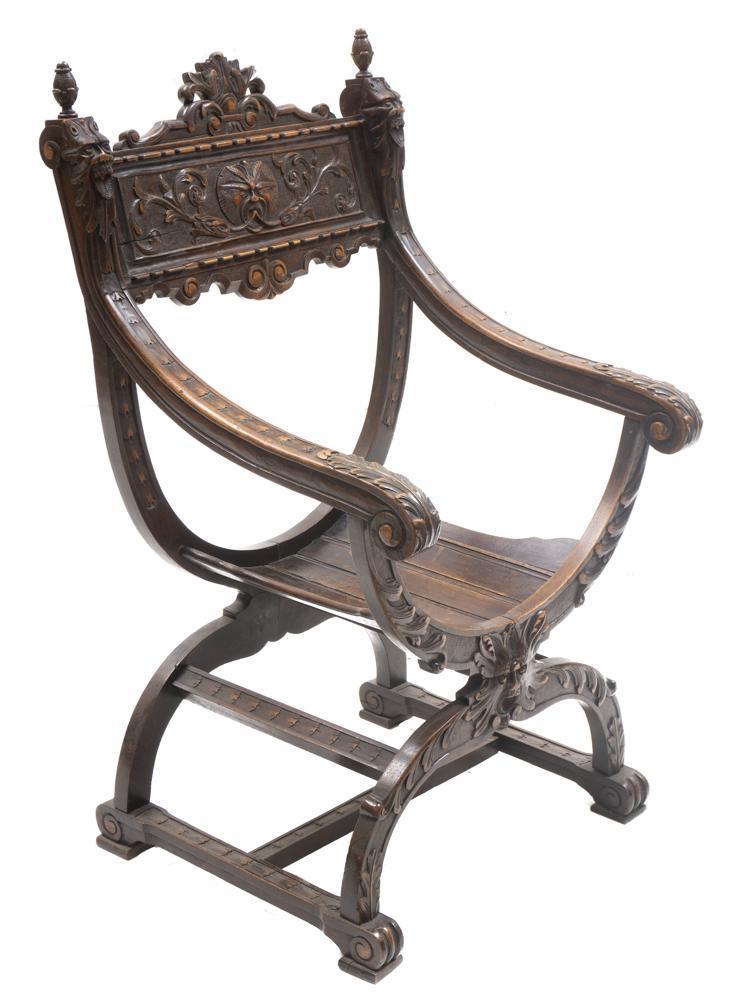 Italian Renaissance Savonarola Chair: Italian Renaissance Savonarola chair, carved, stretchered legs 40.5" tall x 24" wide x 18" deep State-wide delivery is available for this item. Please email shipping@vogtauction.com or call 210-822-61