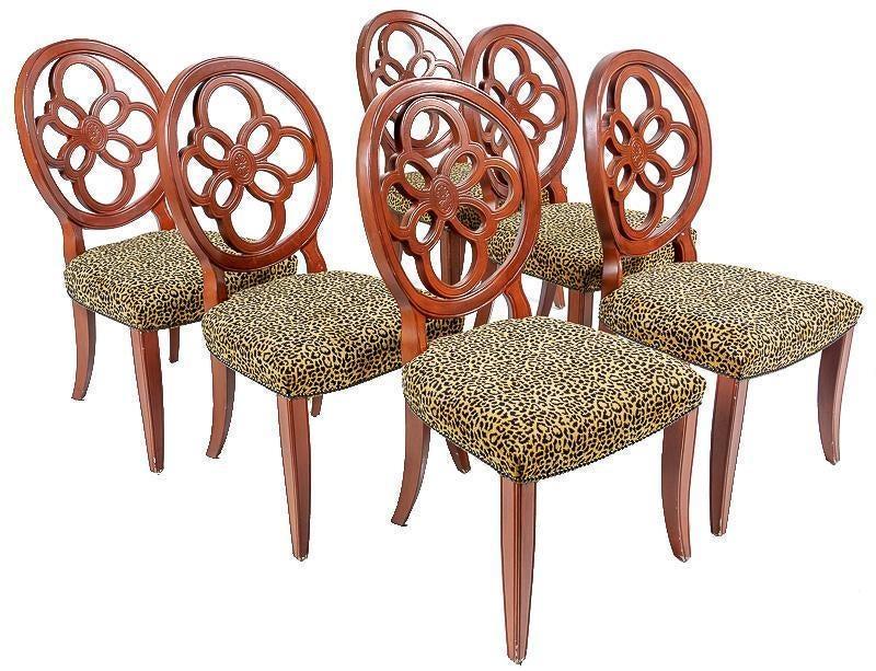 Set of 6 Circle Back Dining Chairs: Provenance: The Estate of Barbara Kessler Banker Set of 6 circle back dining chairs, leopard fabric upholstery, stud accents, floral accents 42" tall x 22" wide x 20" deep/ Each State-wide delivery is