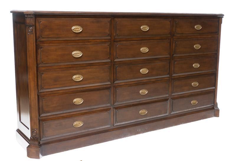 Monumental Apothecary Cabinet: Provenance: An Olmos Park, TX Estate Monumental apothecary cabinet, bank of 15-drawers, brass fixtures 49.5" tall x 92" wide x 19.5" deep In-House Shipping & Delivery NOT available on this item. Pleas