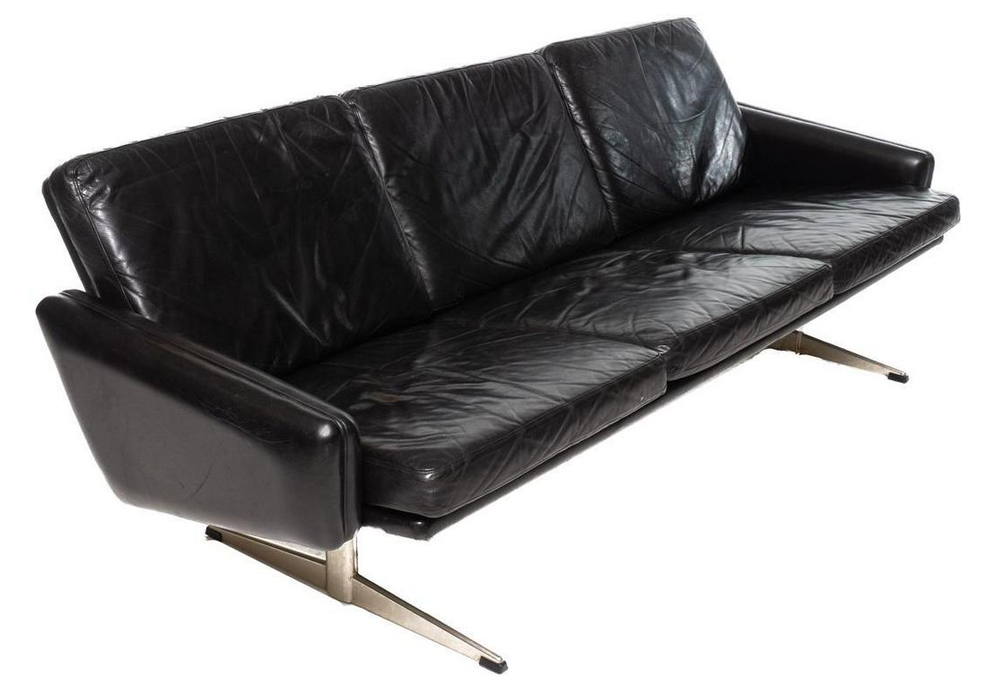 Danish Mid-Century Leather Sofa: Danish Mid-Century leather sofa, chrome lets, 3-seat 27" tall x 75.5" wide x 32" deep State-wide delivery is available for this item. Please email shipping@vogtauction.com or call 210-822-6155 for a q