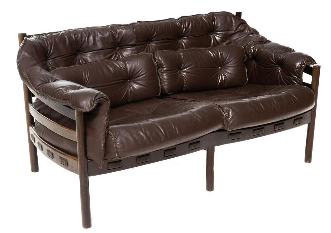 Danish Mid-Century Leather Sofa: Danish Mid-Century leather sofa, 2-seat, wooden frame, button back 28" tall x 58" wide x 34" deep State-wide delivery is available for this item. Please email shipping@vogtauction.com or call 210-822-