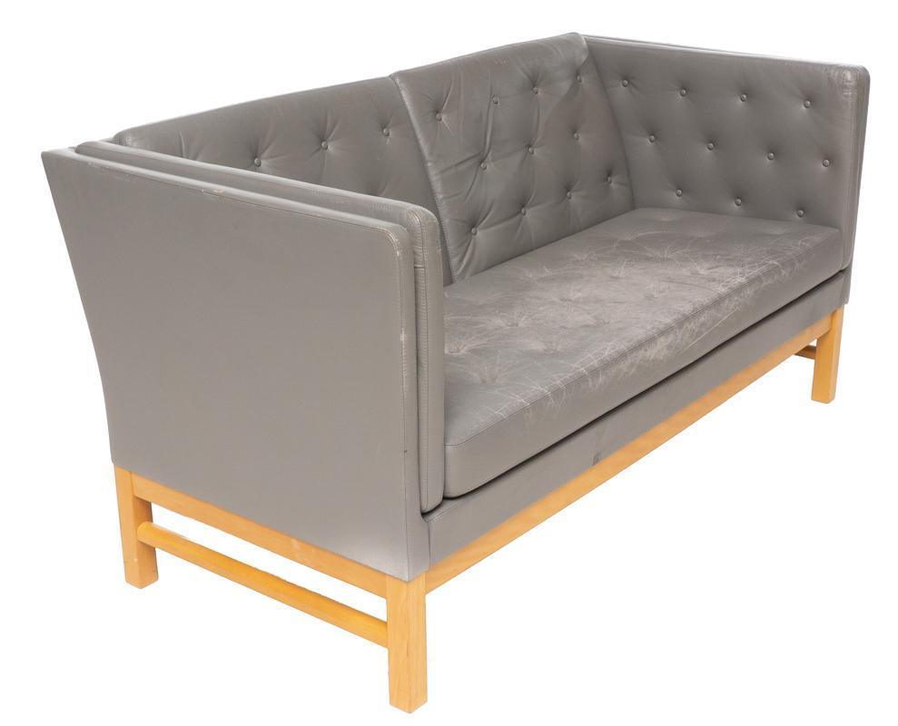 Mid-Century Leather Sofa: Mid-Century leather sofa, grey, button back, wooden legs 31" tall x 60.5" wide x 30" deep State-wide delivery is available for this item. Please email shipping@vogtauction.com or call 210-822-6155 for