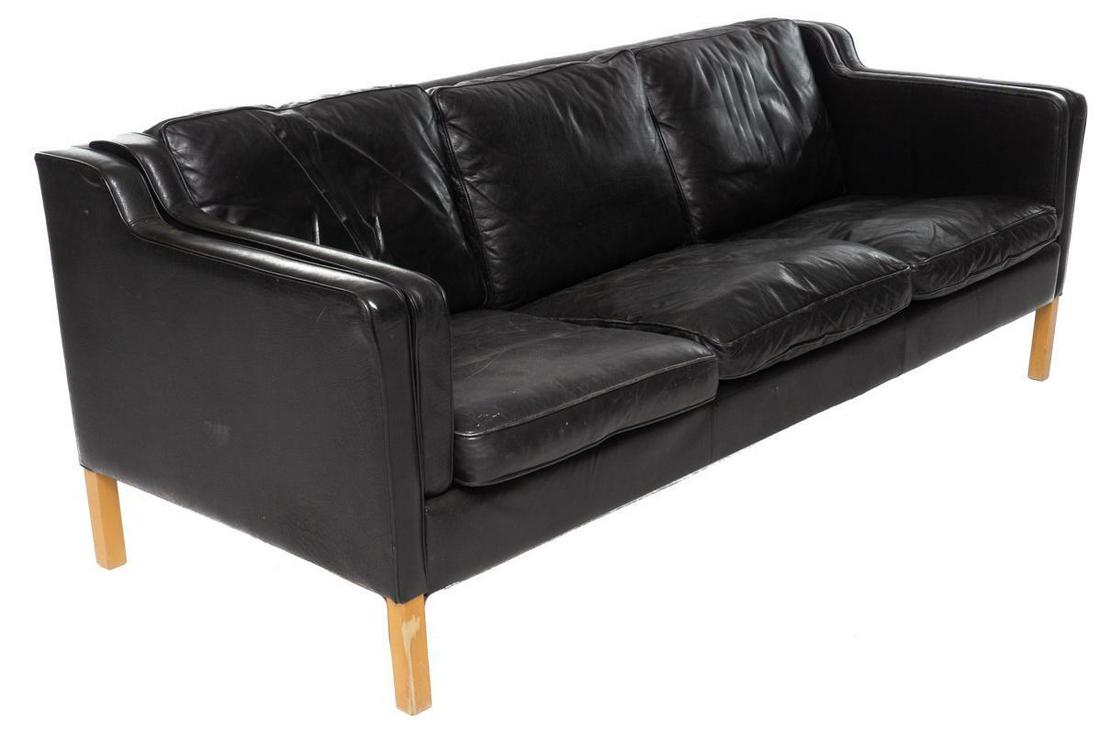 Danish Mid-Century Leather Sofa: Danish Mid-Century leather sofa, 3-seat, wooden legs 29.5" tall x 79" wide x 32.5" deep State-wide delivery is available for this item. Please email shipping@vogtauction.com or call 210-822-6155 for a