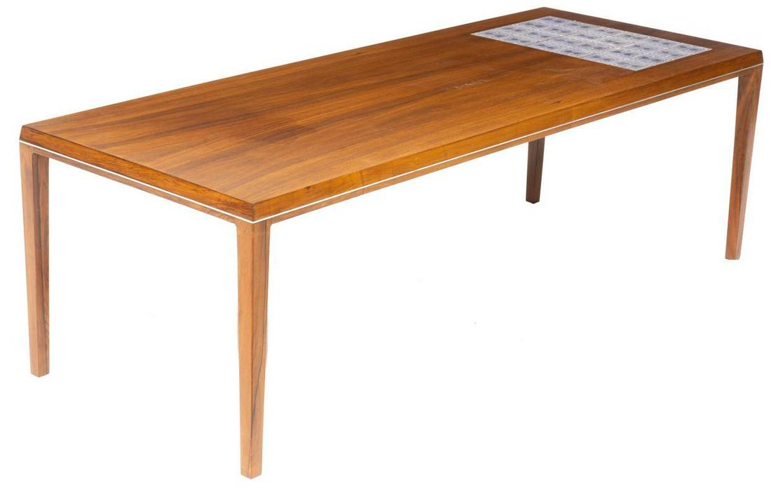 Mid-Century Tile Top Coffee Table: Mid-Century tile top coffee table, blue and white abstract motif, straight legs 20" tall x 62" wide x 24" deep State-wide delivery is available for this item. Please email shipping@vogtauction.com or 