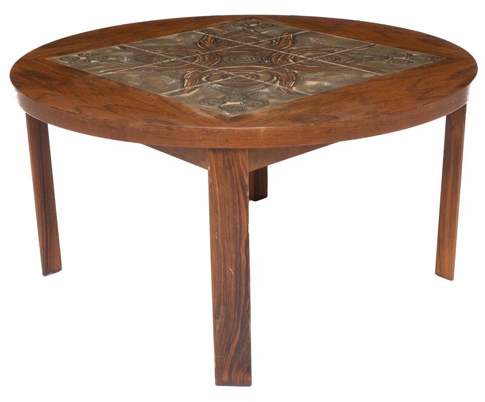 Mid-Century Tile Top Coffee Table: Mid-Century tile top coffee table, circular, wooden base, abstract motif 20" tall x 38" diameter State-wide delivery is available for this item. Please email shipping@vogtauction.com or call 210-822-6
