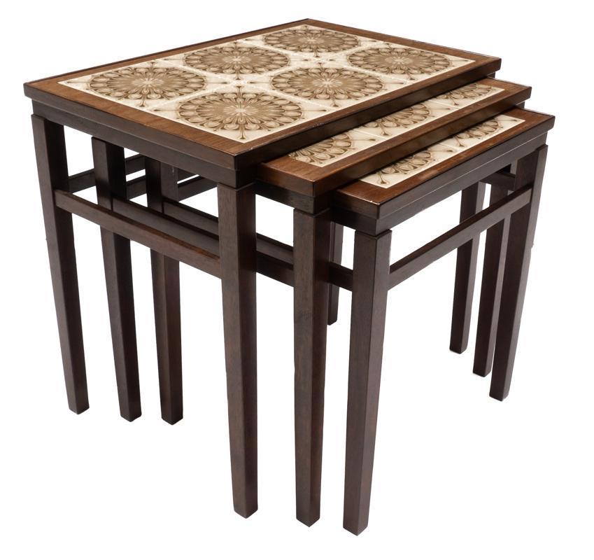 Nest of 3 Mid-Century Tile Top Tables: Nest of 3 Mid-Century tile top tables, floral motif, wooden frame 19.5" tall x 21.5" wide x 14" deep/ Largest State-wide delivery is available for this item. Please email shipping@vogtauction.com or c