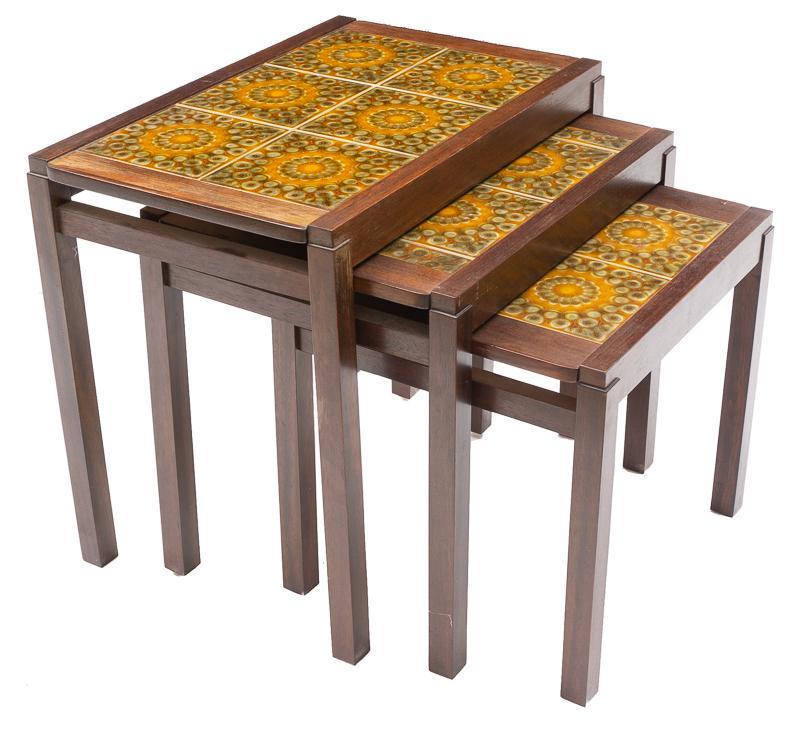 Nest of 3 Mid-Century Tile Top Tables: Nest of 3 Mid-Century tile top tables, abstract motif, wooden frame, straight legs 19" tall x 21.5" wide x 14" deep/ Largest State-wide delivery is available for this item. Please email shipping@vogta
