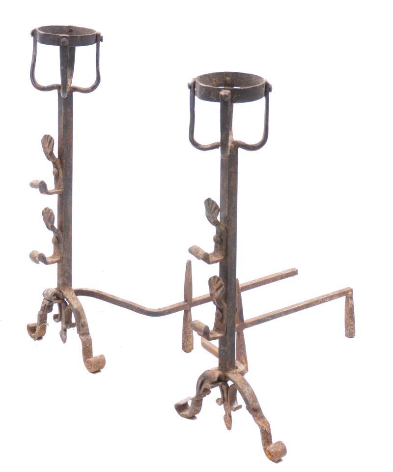 Pair of Wrought Iron Fireplace Andirons: Pair of wrought iron fireplace andirons, scrolled 29.5"h x 13"w x 25"d/ each Condition: Heavy oxidization State-wide delivery is available for this item. Please email shipping@vogtauction.com or call 