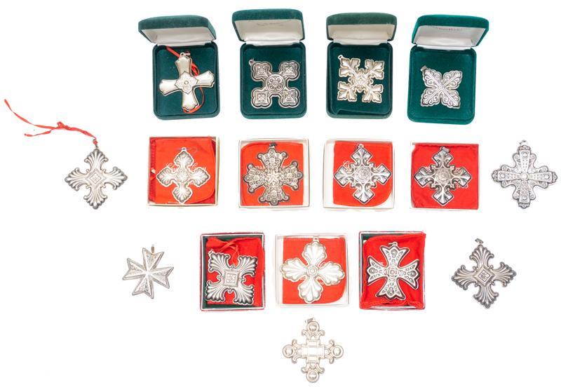 Set of 16 Reed & Barton Sterling Christmas Ornaments: Provenance: The Estate of Mary Ann Delmer, San Antonio, TX Set of 16 vintage Reed & Barton sterling silver cross Christmas ornaments, with some cases 3"h x 3"w/ largest