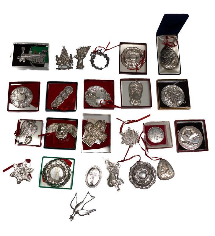 Lot of 25 Sterling Silver Christmas Ornaments: Provenance: The Estate of Mary Ann Delmer, San Antonio, TX Lot of 25 sterling silver Christmas ornaments, includes Gorham examples, with some cases 4.5"h x 3"w/ largest