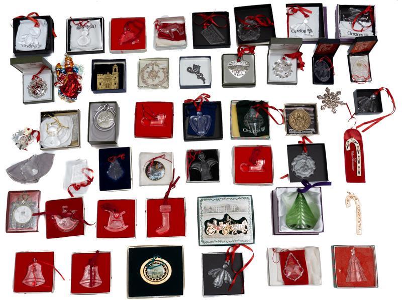 Lot of 47 Vintage Christmas Ornaments: Provenance: The Estate of Mary Ann Delmer, San Antonio, TX Lot of 47 vintage Christmas ornaments, includes Gorham silverplate, Orrefors crystal, glass, etc, in boxes 4"h x 3.5"w/ largest