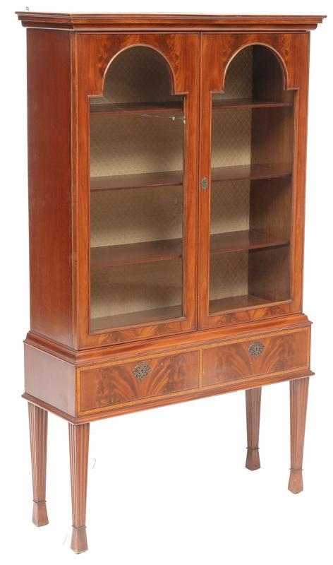 Art Deco Display Case: Art Deco display case, 2-doors, single-drawer, straight legs, curved glass, made in Denmark 69.5"h x 37.5"w x 14.5"d Condition: Broken pane right door State-wide delivery is available for this item. P