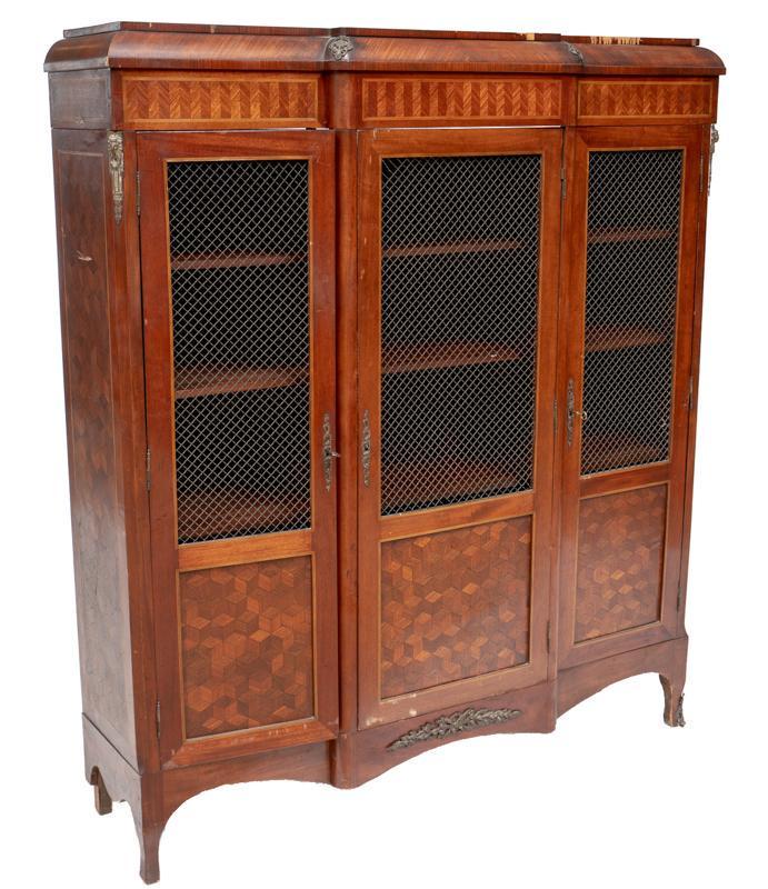 Louis XVI Breakfront Cabinet: Louis XVI breakfront cabinet, includes 2-keys, 3-drawers open to shelved interior, metal hardware, gilt accents 66.5"h x 58"w x 15.5"d Condition: Fragile, previous damage to legs and back, loss to ven