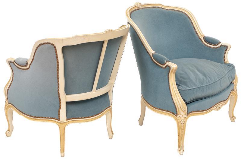 Pair of French Louis XV Bergere Arm Chairs: Pair of French Provincial bergere arm chairs, blue upholstery, wooden frame, stud accents 35"h x 29"w x 31"d/ each State-wide delivery is available for this item. Please email shipping@vogtauctio