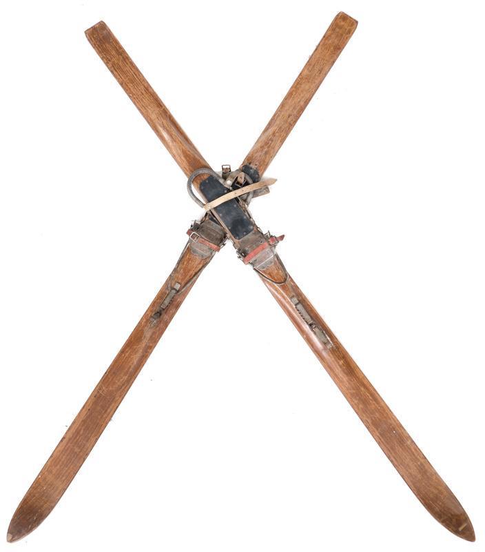 Vintage Wooden Skis: Vintage wooden skis, metal hardware 70.5"h x 4"w/ each State-wide delivery is available for this item. Please email shipping@vogtauction.com or call 210-822-6155 for a quote. IN-HOUSE SHIPPING is NOT 