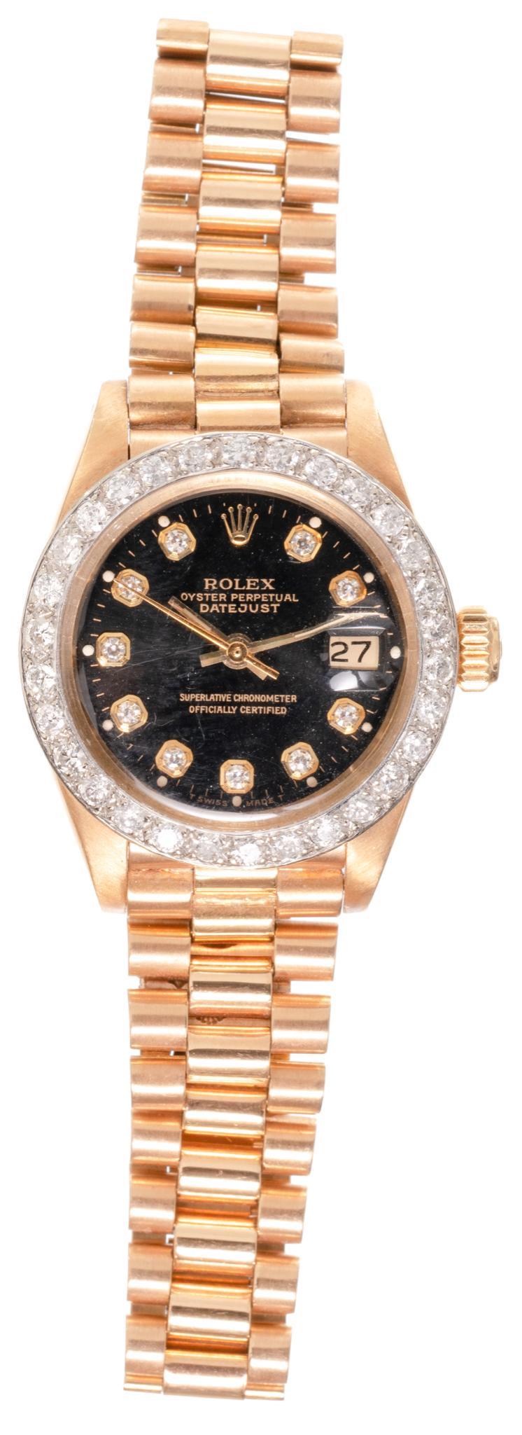 Rolex Oyster Perpetual Diamond 18k Gold Ladies Watch: Approx. 41 diamonds in bezel, oyster perpetual datejust model 6917, SN: 6524504, weight: 63.5 grams gross (with extra links), bezel is aftermarket Provenance: A prominent San Antonio, Texas living es