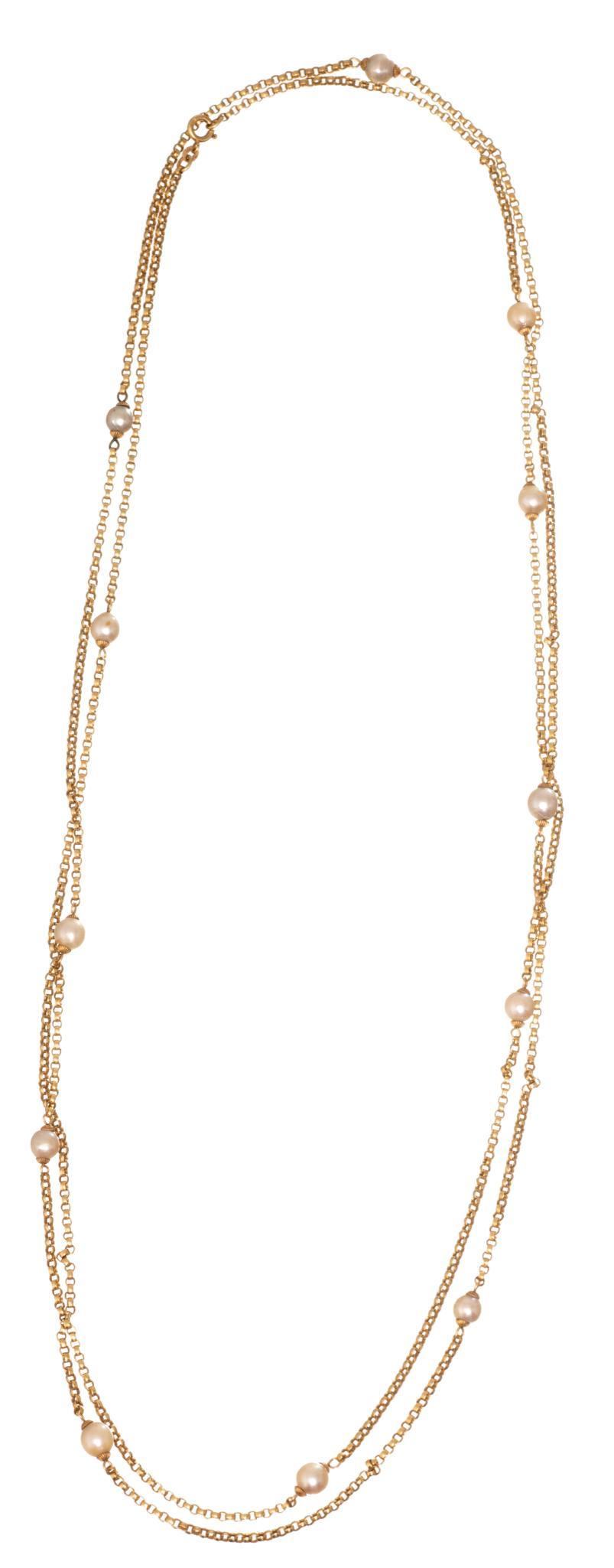 Baroque Pearl Lariat 18k Gold Necklace: 12 baroque pearls, measures: 64", weight: 48.8 grams gross Provenance: A San Antonio, Texas Estate