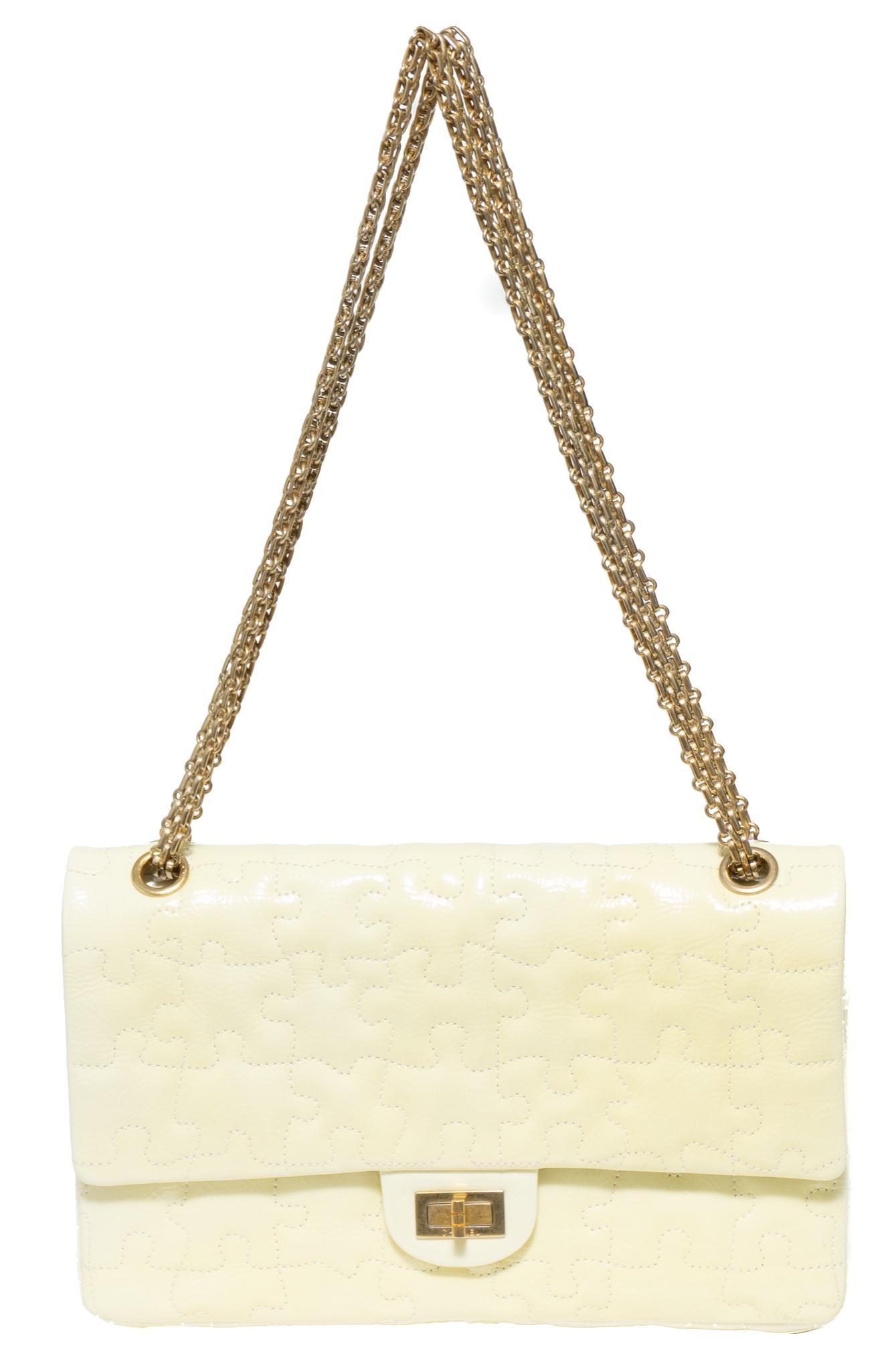 Chanel Puzzle 2.55 Reissue - 226 Shoulder Bag: Chanel Puzzle 2.55 Reissue - 226 Shoulder Bag in white puzzle quilted calf leather & reissue chain handle with gold tone hardware, marked: 12147148, measures: 7.5 x 11 x 2.25", inc